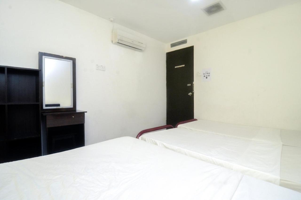 Spot On 89886 Backpacker'S Stay Services Kuching Exteriör bild
